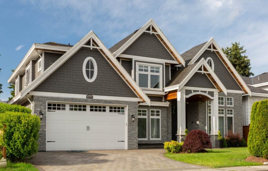 Home with shingle and shake siding